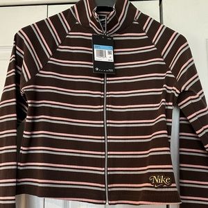 New with tags Nike tight fit women’s brown stripe full zip top size medium